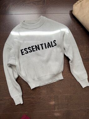 Essentials Cream Crewneck Logo Sweater with Black Text